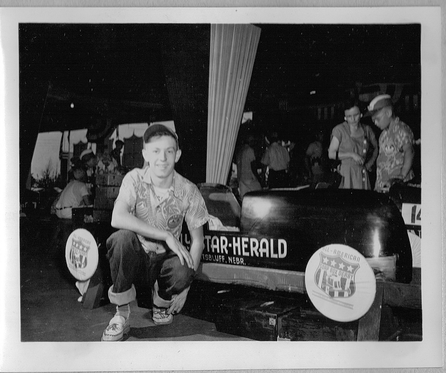 Dick Otte with his car in Akron for the All American Soap Box Derby, August 1951. His Akron sponsor was the Scottsbluff Daily Star-Herald.